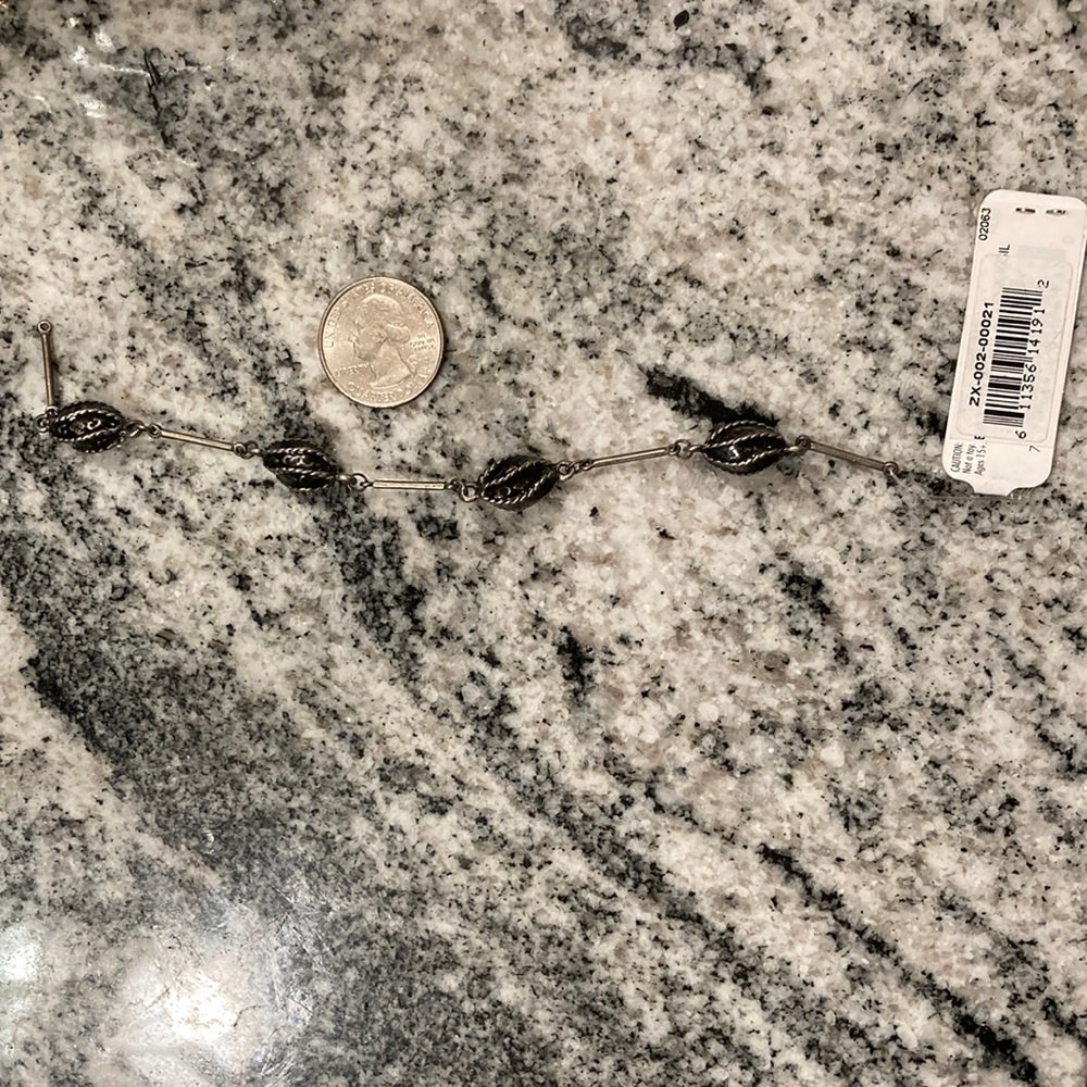 Metal bead strand